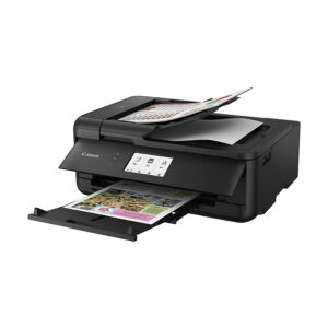 A side angle of the Canon PIXMA TS9550 with printed documents and documents ready to scan.