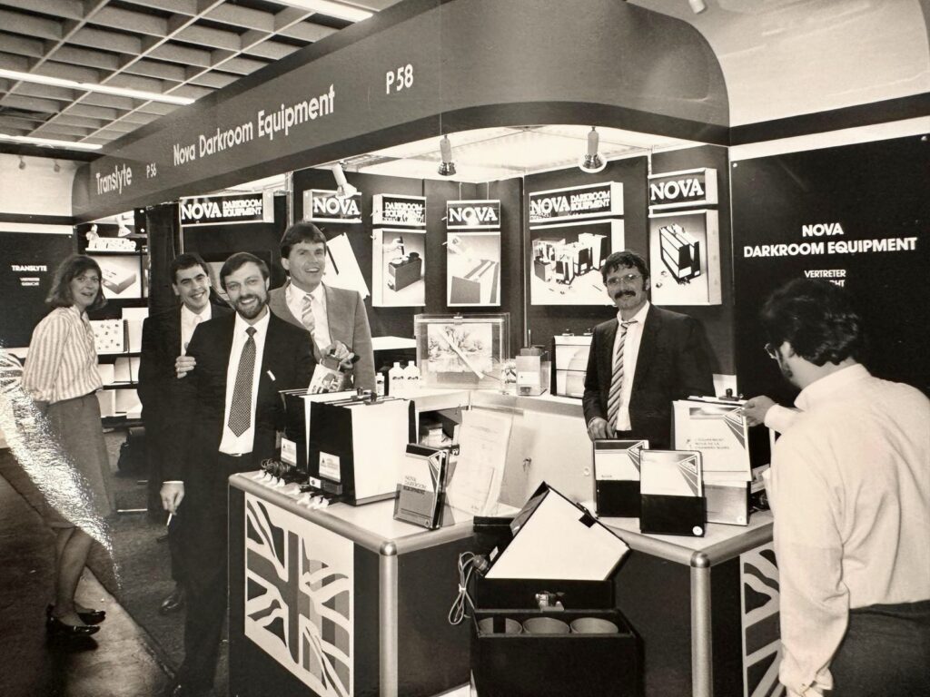 Selection of employees stood in front of Nova's first stand at Photokina in Germany